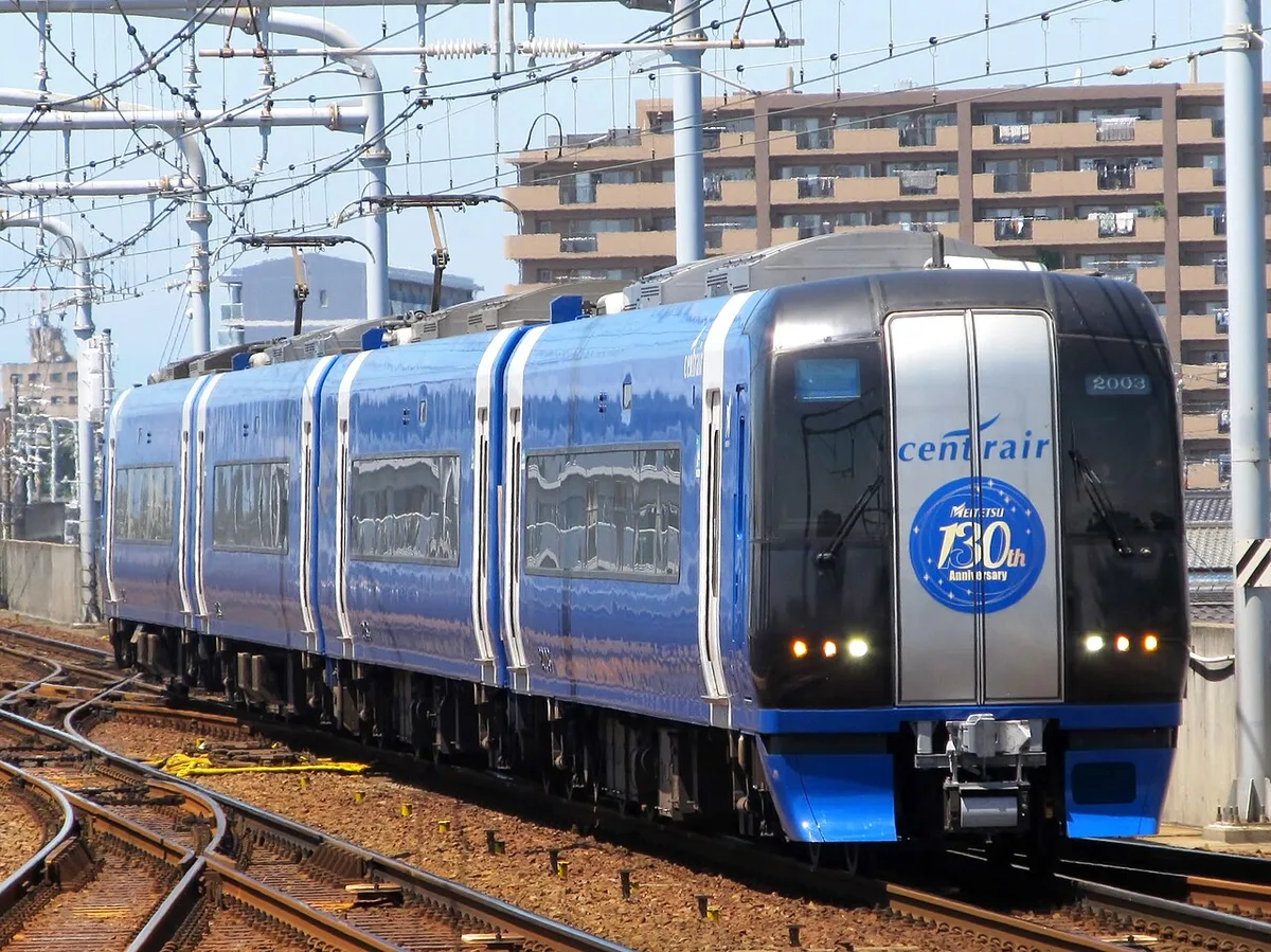 A blue Meitetsu 2000 series μSKY airport train with the centrair logo on its front